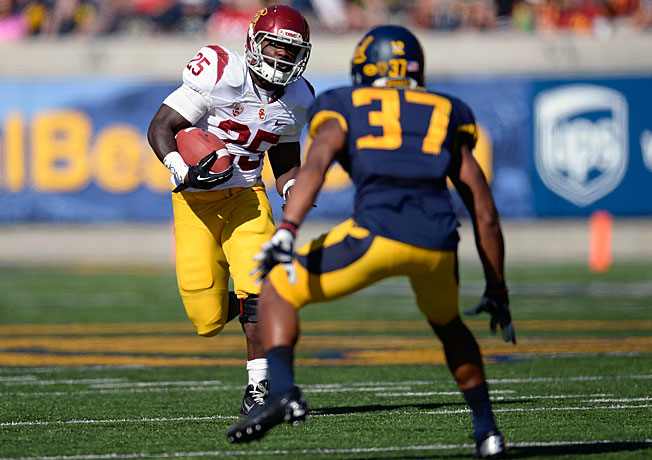 Silas Redd (25) ran for 1,281 yards and 10 TDs in two years after transferring to USC from Penn State.